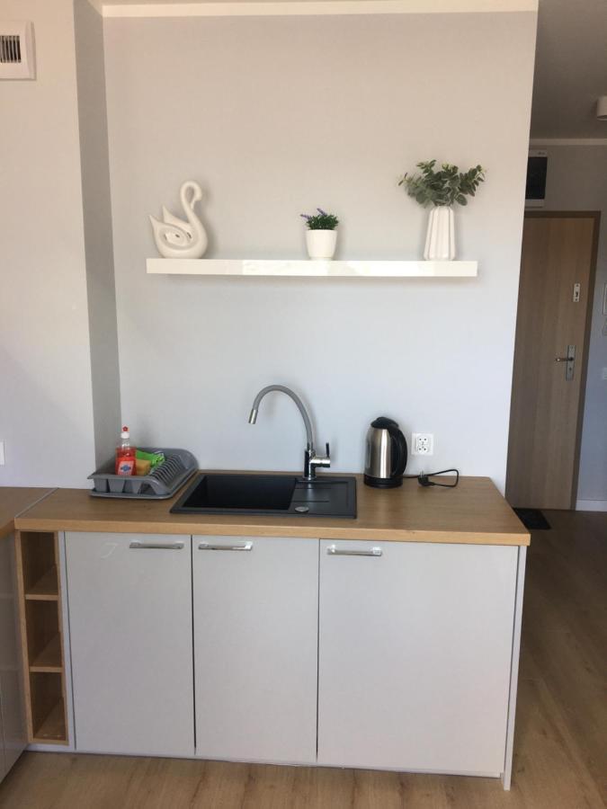 Apartament Sloneczne Tarasy Neo Dziwnówek Buitenkant foto