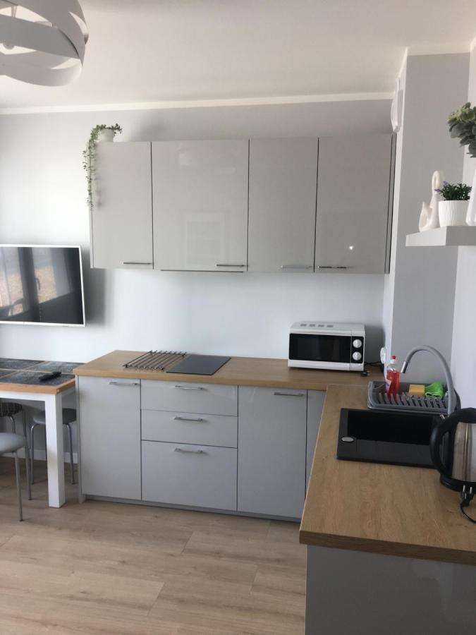 Apartament Sloneczne Tarasy Neo Dziwnówek Buitenkant foto